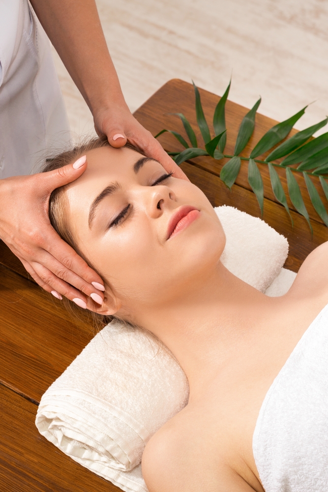 Massage therapist doing TMJ Massage - Pan Thai Massage - Sugar Land, TX
