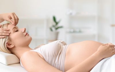 A pregnant woman enjoying a Sugar Land prenatal massage