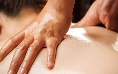 A therapist performing Sugar Land Thai massage