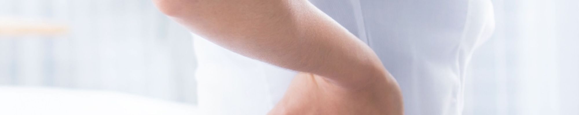 A woman having sciatica pain